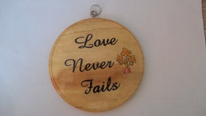 Wooden Circular Wall Plaque - Love Never Fails